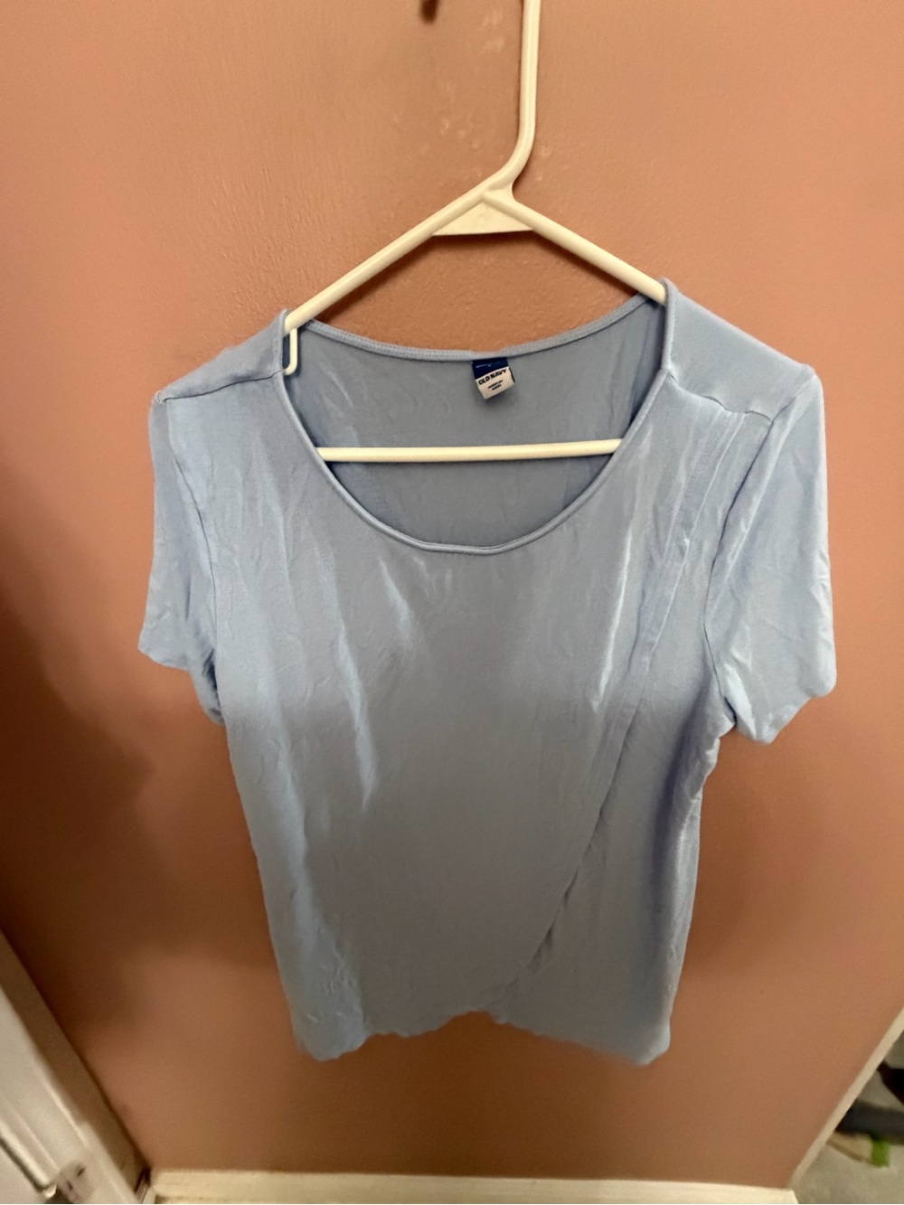 Light blue maternity top.